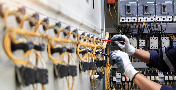 Professional Electrician technician working in Middle Island, NY